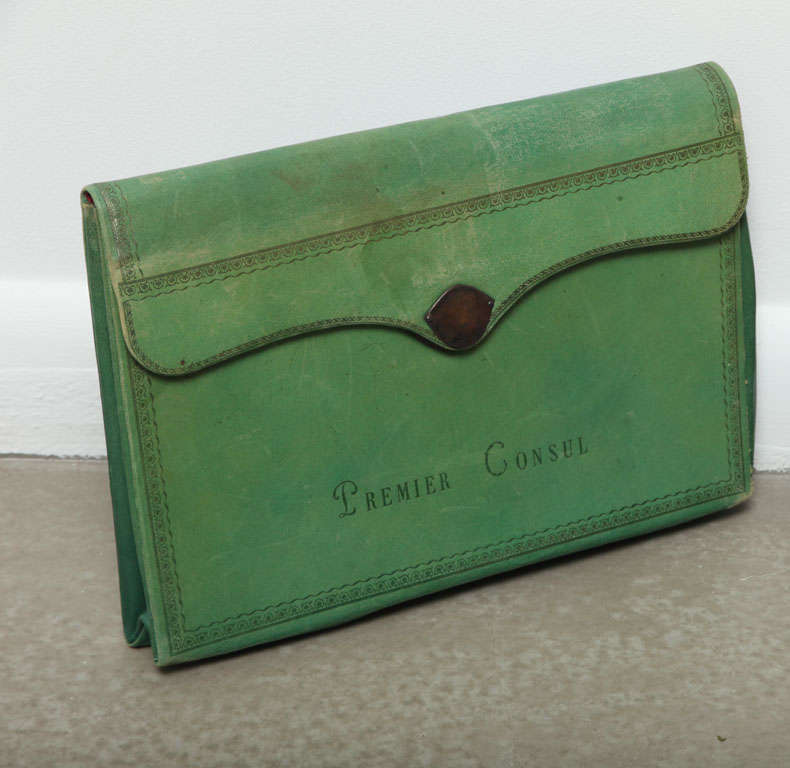 French Embossed Green Leather Document Case, third quarter 19th century, the  delicate embossed border surrounding Premier Consel, and opening to reveal a red-pink interior, with a brass closure.